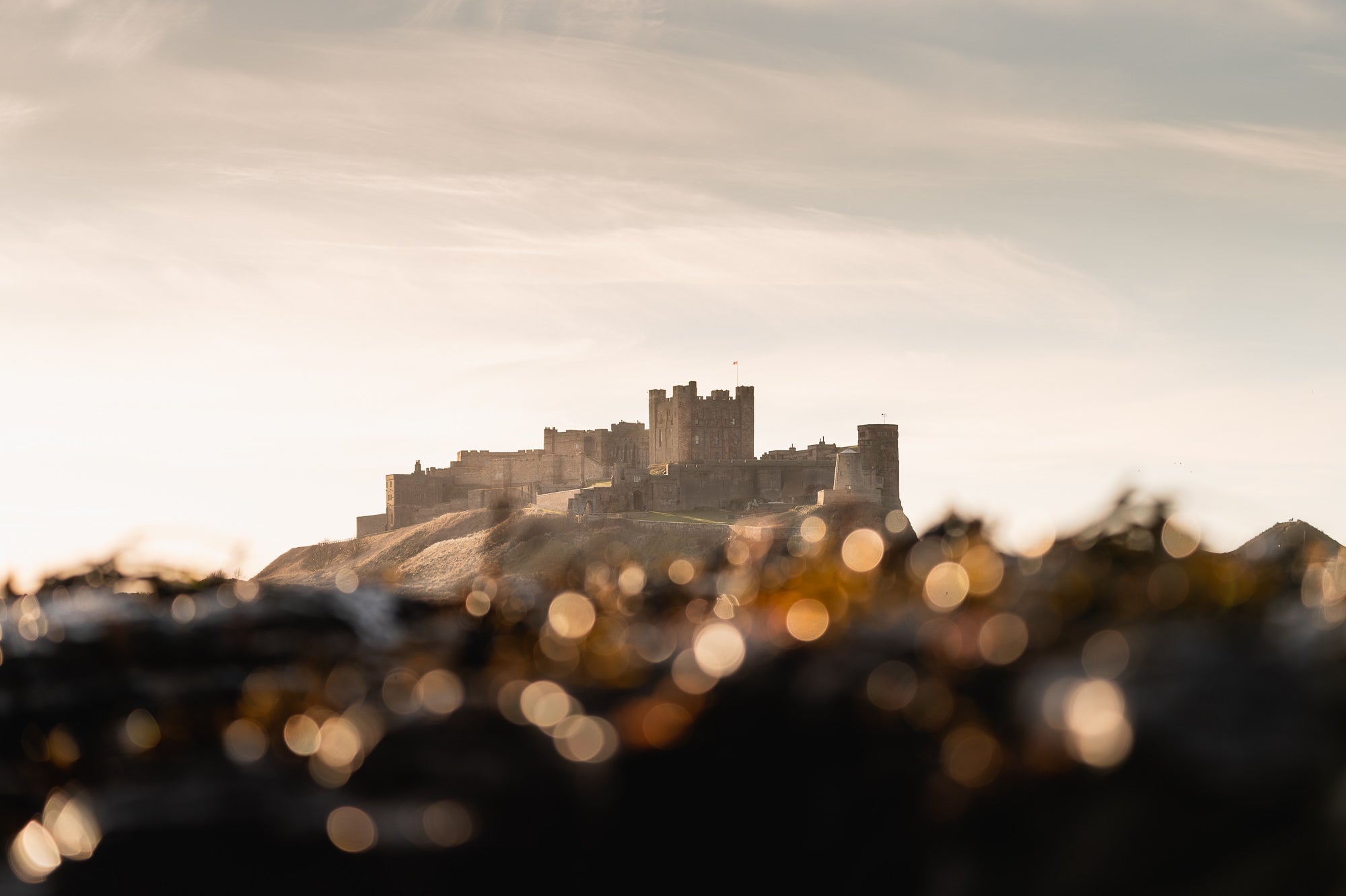 &ldquo;Bamburgh Bokeh, using the telephoto compress the scene and create some foreground bokeh.&rdquo; Photo by Daryl Scott Walker. Sony Alpha 7 III. Sony 100-400mm f/4.5-5.6 G Master. 1/800-sec, f/4.5, ISO 160